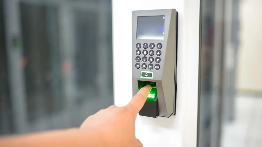 Fingerprint access control reader at an office door